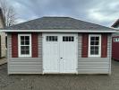 10x16 Hip Roof with Vinyl Siding and Shelves